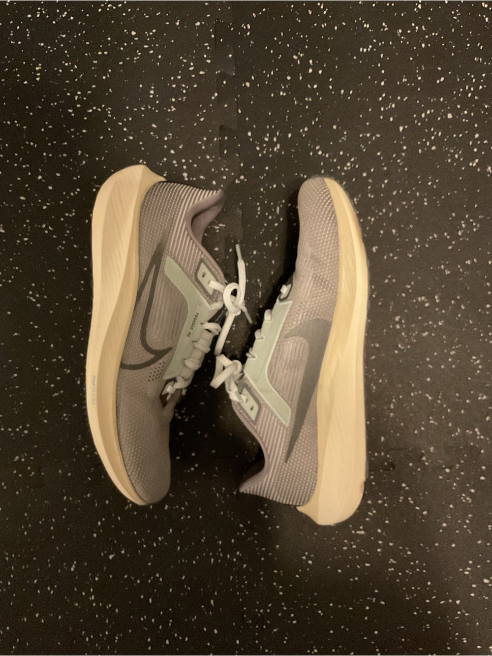 Nike men’s Gray and Mint Green Running Sneakers